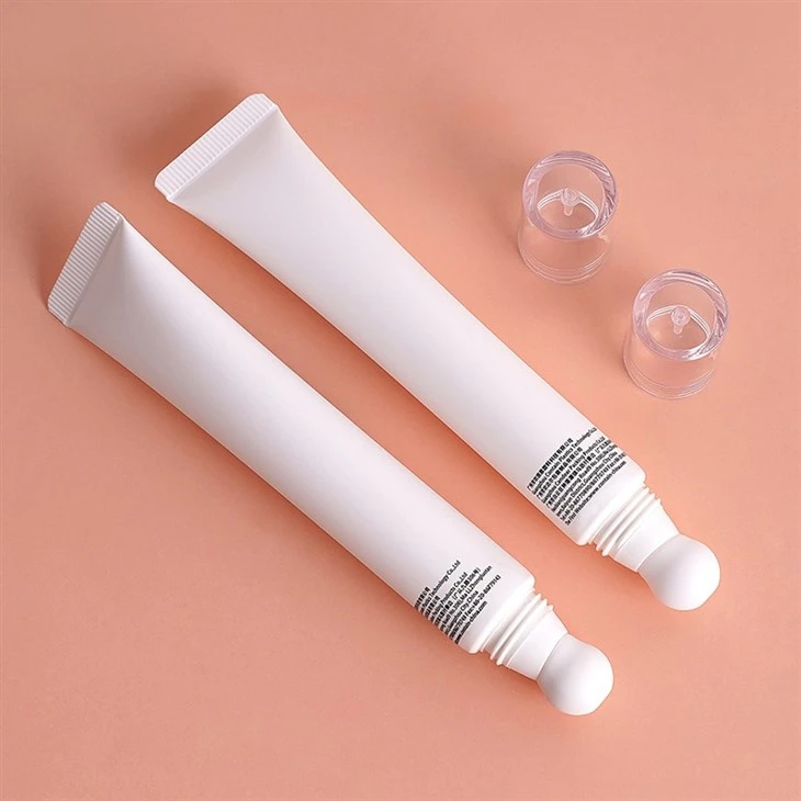Private Label Wholesale White Pink Plastic Tube Massage Container Eye Cream Packaging Squeeze Tube With Ceramic Applicator